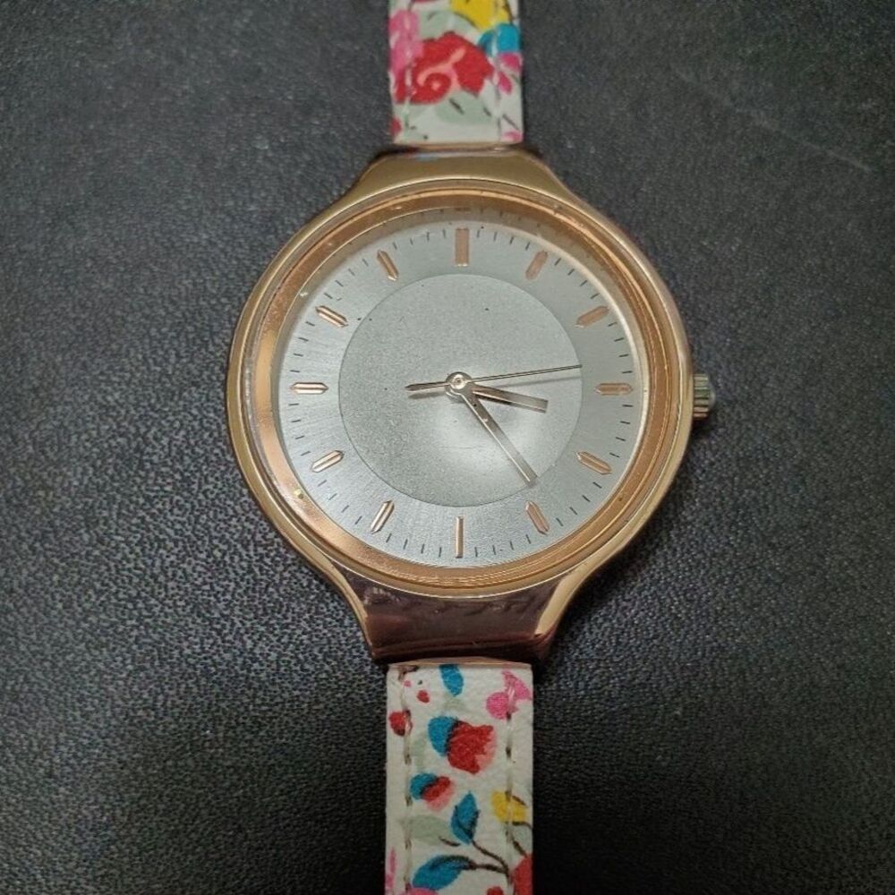 Rose gold tone flowered watch